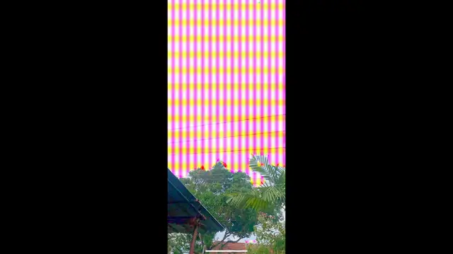 An outdoor AR scene where the sky is recoloured in stripes by the segmentation system, with a virtual character standing on a path