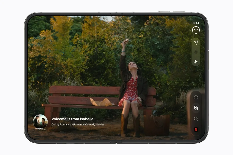 Apple press image of the Netflix app on the iPhone Duo inner screen in landscape, with status, actions and tab bar stacked down the right edge
